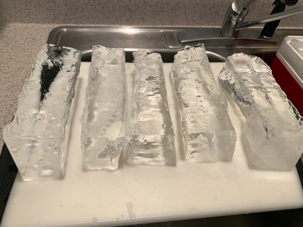 Cutting clear cocktail ice into slabs